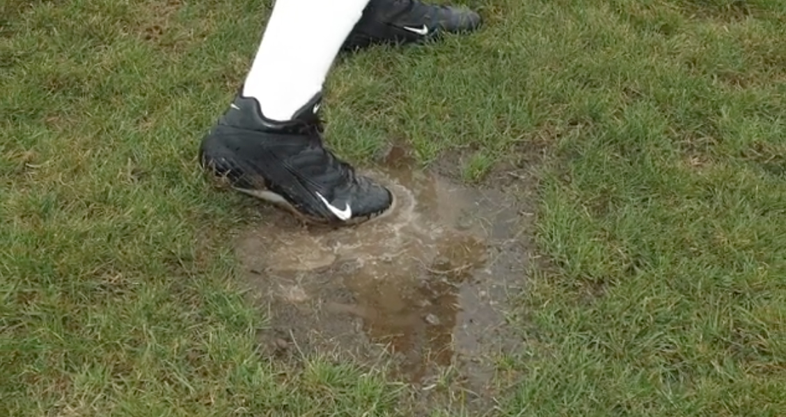 Muddy turf.