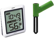 Digital soil moisture meter and green probe sensor shown on a white background.