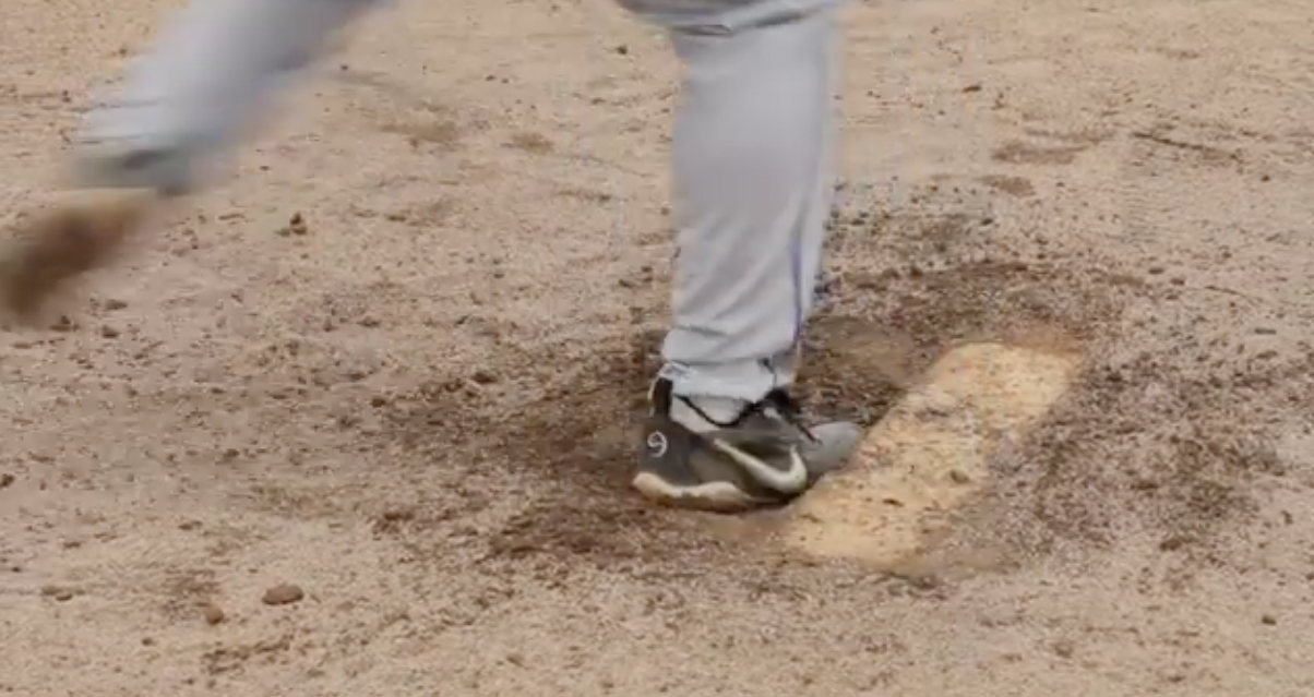 Pitching mound with deep ditch.