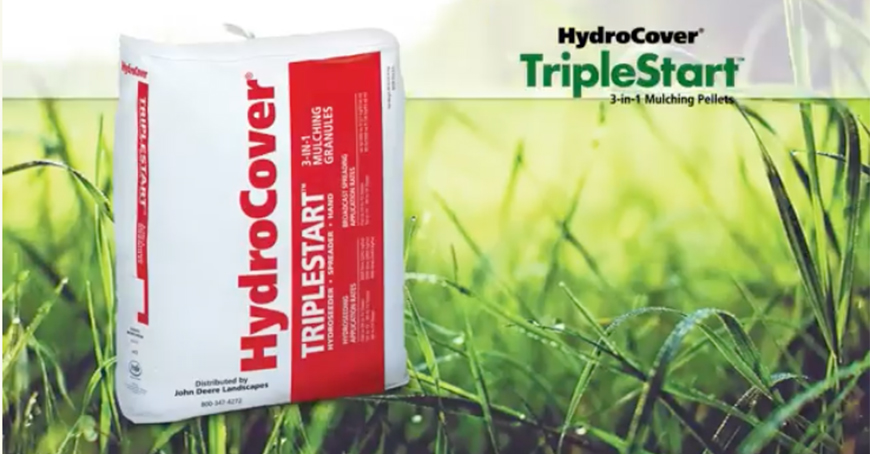 A bag labeled HydroCover TripleStart 3-in-1 Mulching Pellets sits on grass, with branding and product name visible.