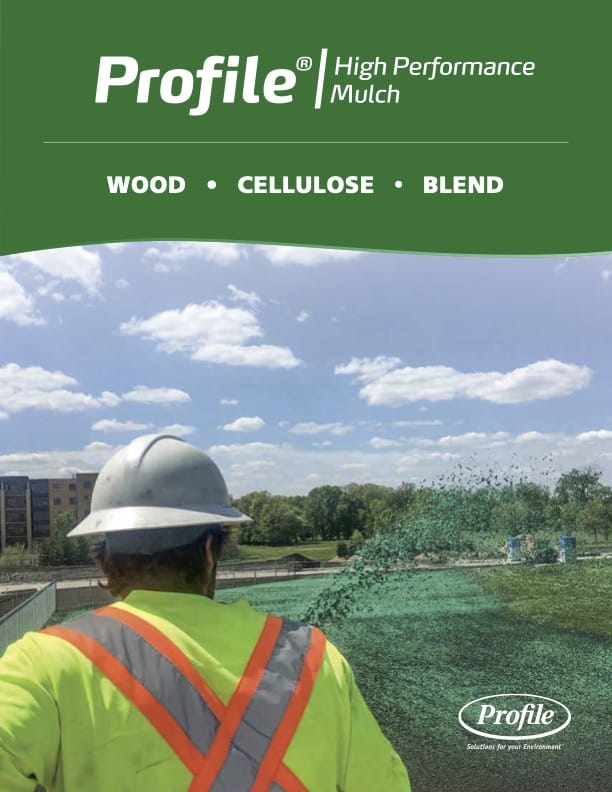 A worker in a hard hat and safety vest operates a mulch sprayer in a grassy area under a blue sky. Text reads Profile High Performance Mulch—WOOD • CELLULOSE • BLEND and displays the Profile logo.