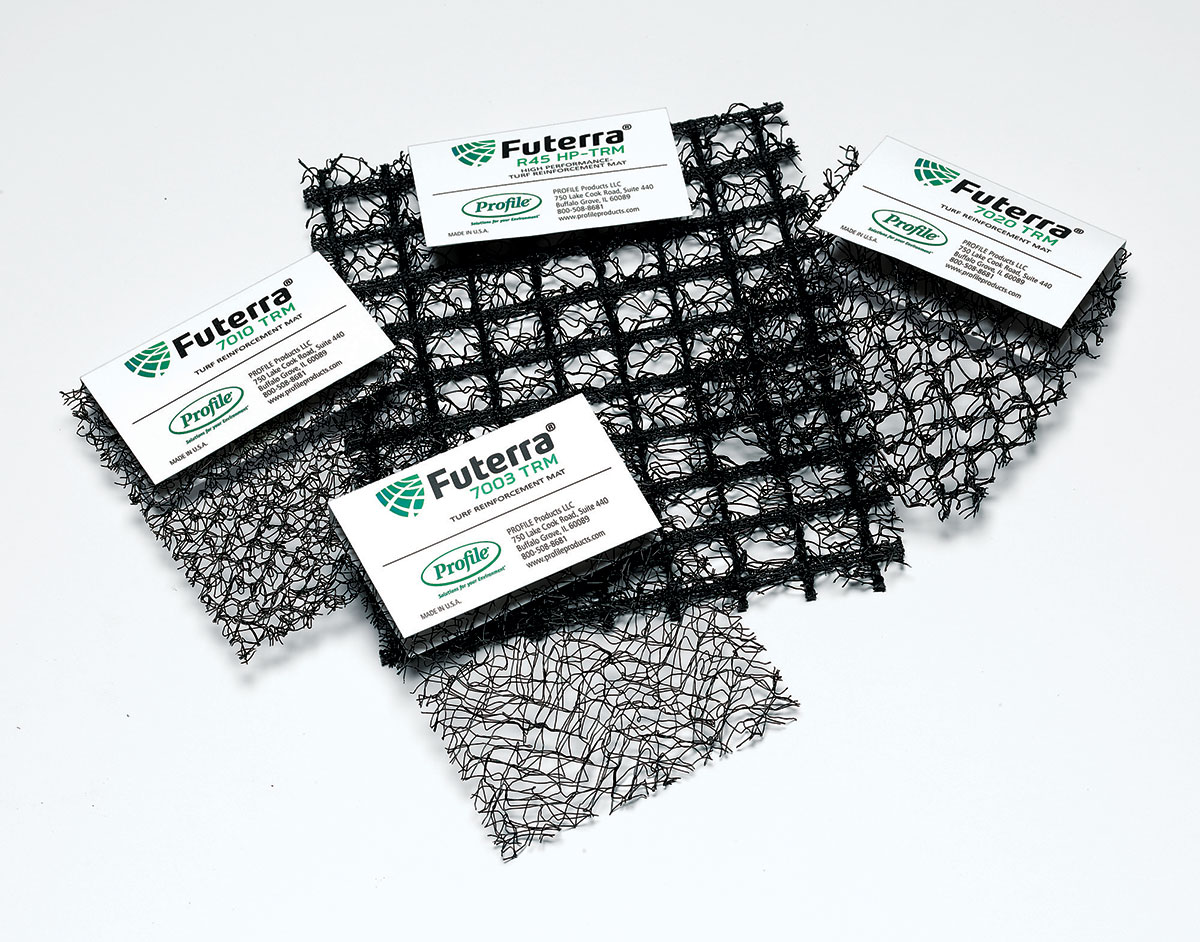 Four black mesh samples, each with varying grid patterns and densities, are arranged on a white surface. Each sample has a label marked Futerra and Profile, indicating different product types.