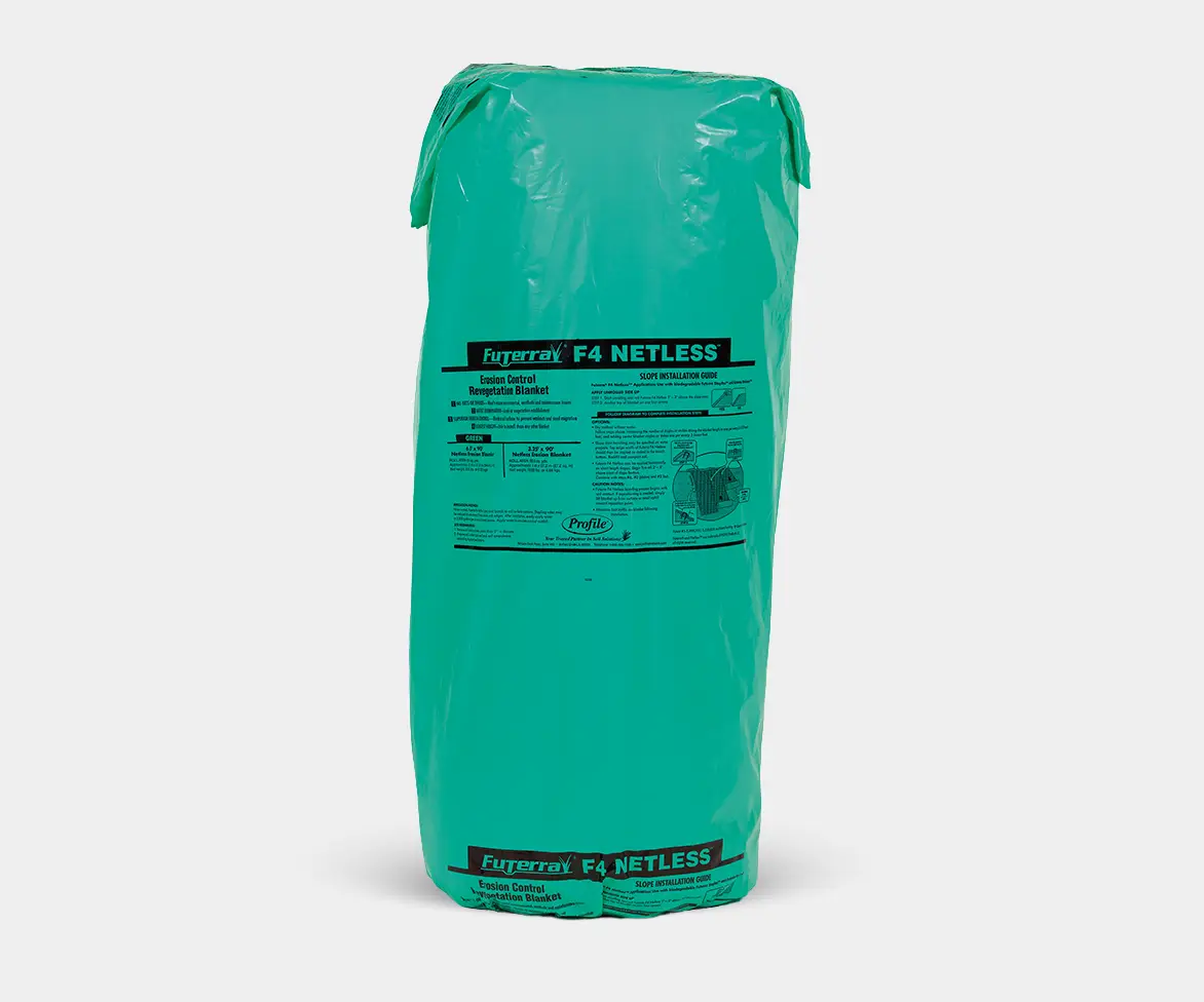 Green plastic-wrapped package labeled “Futerra F4 Netless Erosion Control Revegetation Blanket” with installation instructions printed on the front.