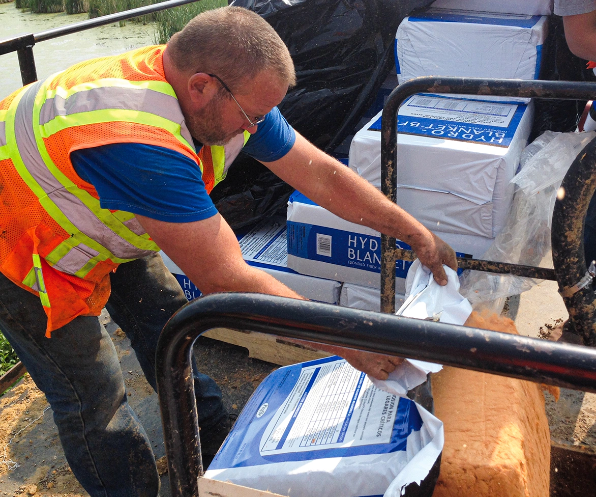 Crew loading Hydro Blanket bags.