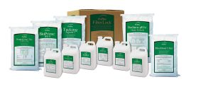 A variety of labeled white bags and plastic jugs of ProPlus products, arranged in front of a cardboard box labeled FiberLock, all with green and white labels.