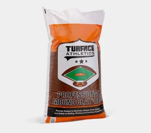 A large bag labeled Turface Athletics Professional Mound Clay-Red with a baseball field graphic, primarily orange, white, and brown colors, standing upright on a plain background.