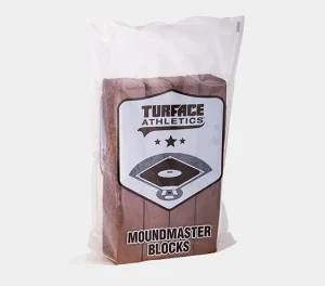 A clear plastic bag labeled Turface Athletics MoundMaster Blocks containing several brown rectangular blocks, with a baseball field graphic on the front of the packaging.