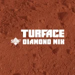 A close-up of reddish-brown infield dirt with the words Turface Diamond Mix and an SAF diamond logo in the center.