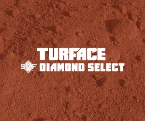 Red infield soil texture with the words Turface Diamond Select and an SAF logo in white bold letters centered on the image.