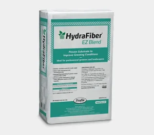 A white and green bag labeled HydraFiber EZ Blend, a substrate for growing plants, sits upright. The packaging highlights its use for professional growers and landscapers and features usage directions.