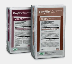 Two white bags of Profile High Performance Mulch stand upright. One bag is labeled Wood with Tackifier and the other Wood. Both display product details and instructions on the front labels.