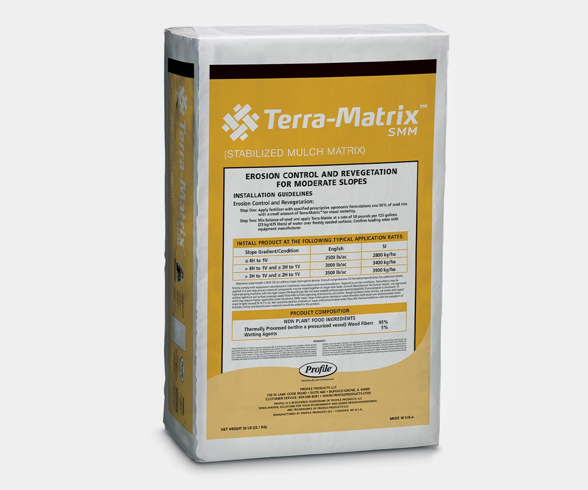 A white and yellow bag labeled Terra-Matrix SMM for erosion control and revegetation, with product information, application rates, and installation guidelines printed on the front.